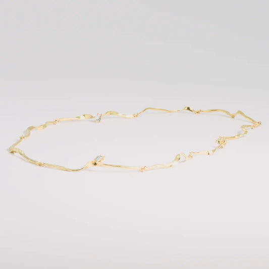 Geelgoud 18kt ketting, handgemaakt uit het atelier van Claire Dries