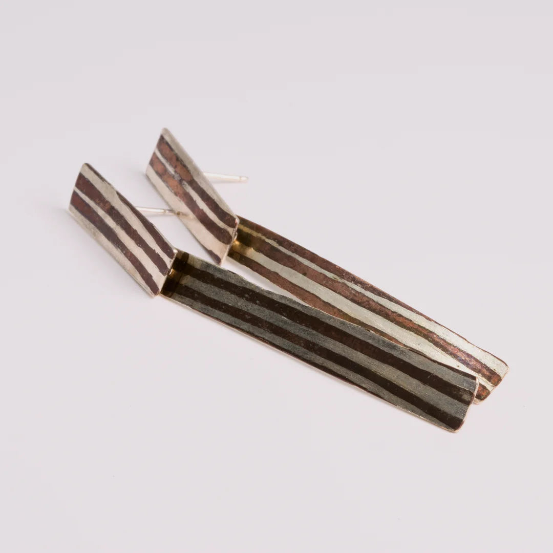 Copper; sterling silver oorbellen, handgemaakt uit het atelier van Claire Dries