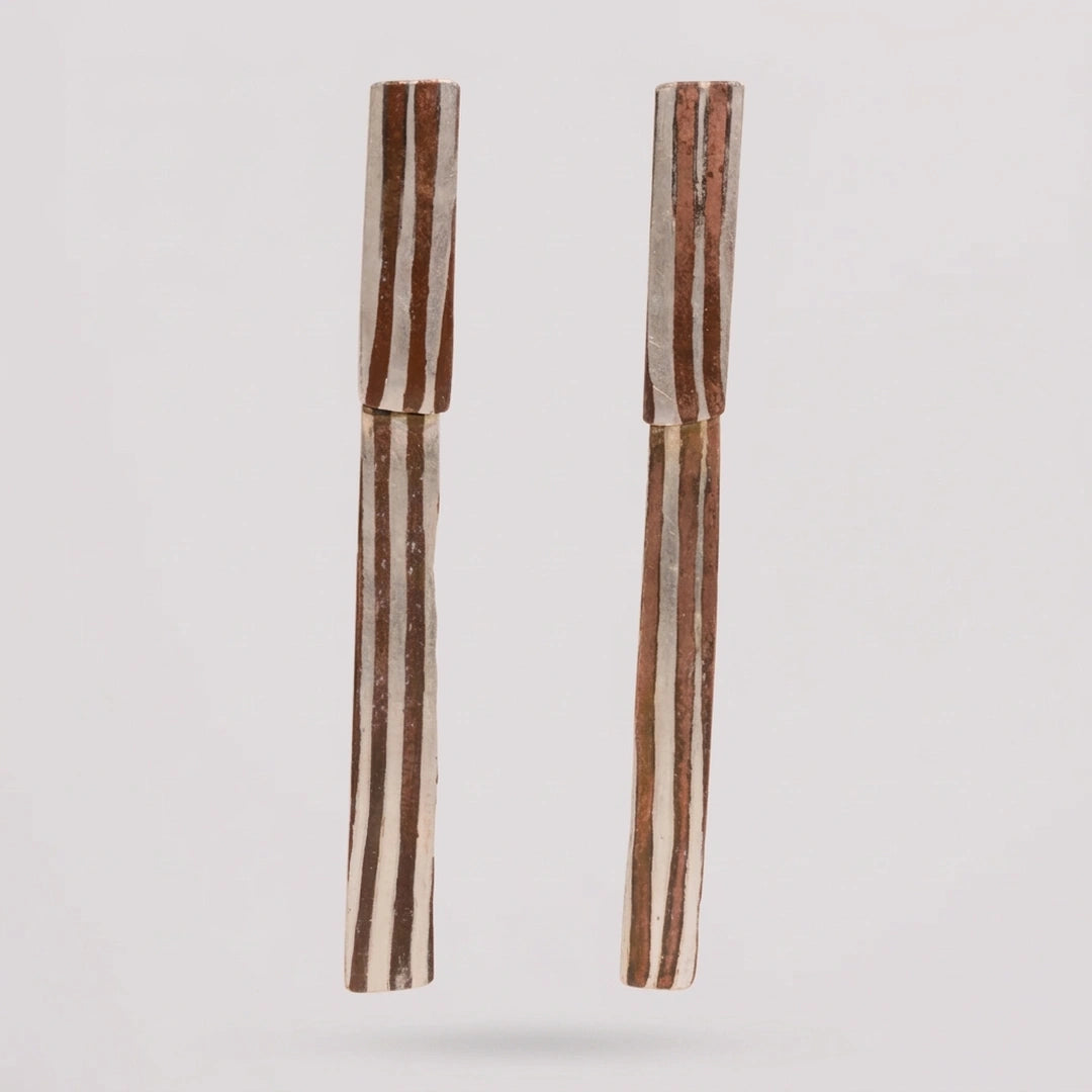 Copper; sterling silver oorbellen, handgemaakt uit het atelier van Claire Dries